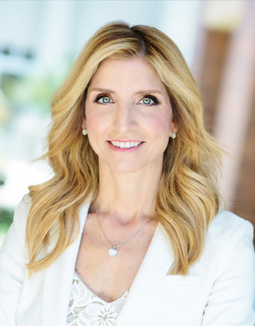 Professional headshot of Kelli Gallogly, South Orange County real estate team